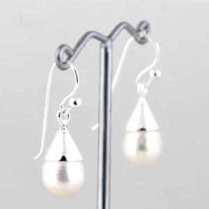 Parel oorbellen met zilver