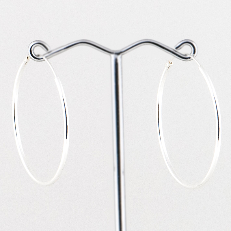 Zilveren oorringen rond 1mm 2