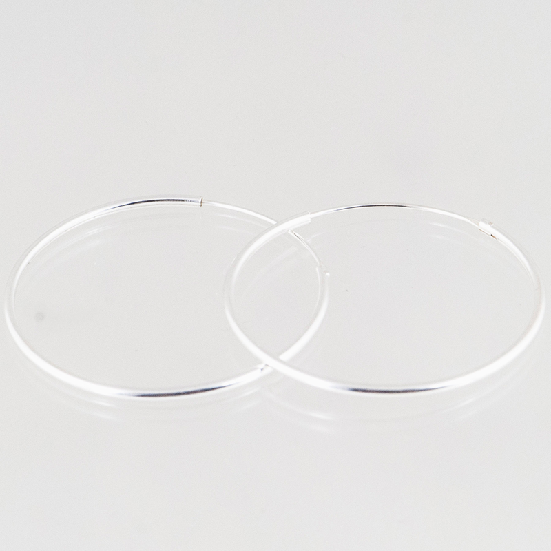 Zilveren oorringen rond 1mm 4