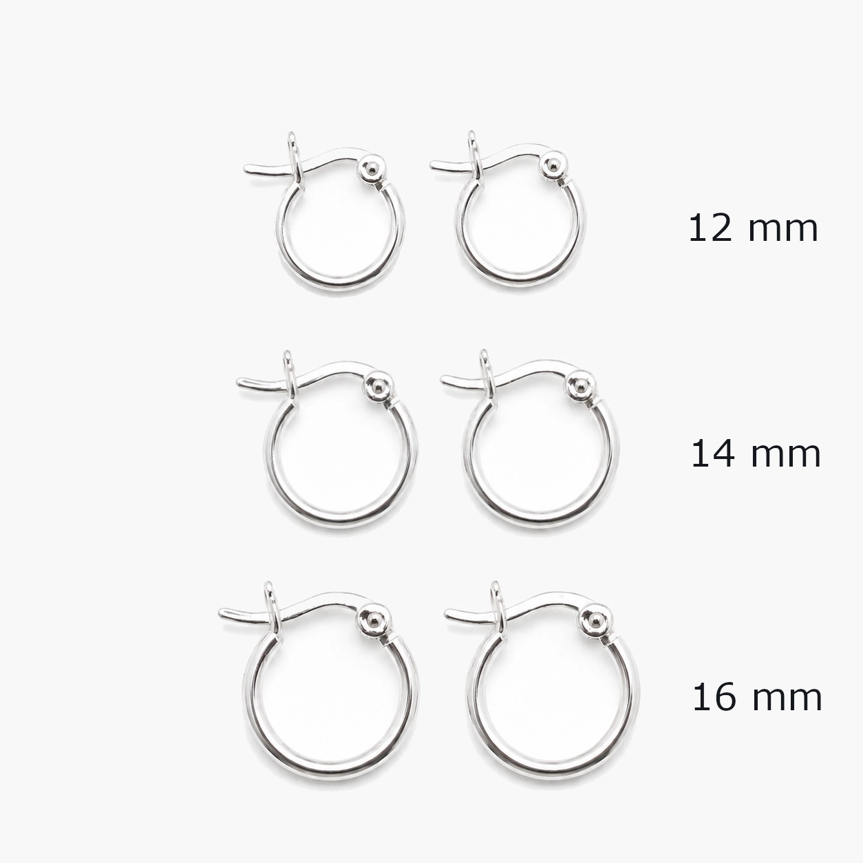 Kleine zilveren oorringen ronde buis en hefboomsluiting - 1,5 mm - 925 zilver - maatvergelijk